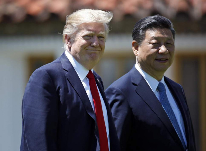 美國總統特朗普(左)、中國國家主席習近平(右)。AP