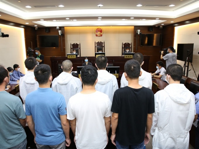 9名被告犯侵犯著作权罪。新华社相片