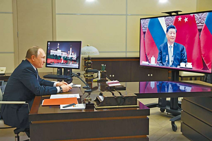 ■習近平和普京前日舉行視頻峰會。