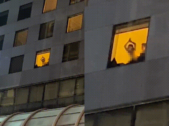 一对男女疑于酒店房内的窗前亲热。影片截图