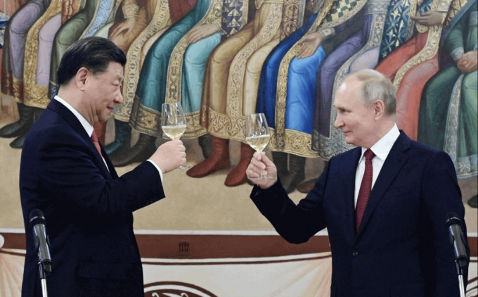 国家主席习近平与俄罗斯总统普京2023 年 3 月 21 日出席在俄罗斯莫斯科克里姆林宫举行的招待会。路透社
