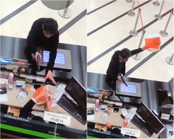 中年男匪手持手槍打劫中環東亞銀行總行。