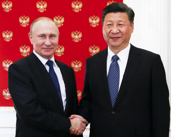 习近平在克里姆林宫与俄罗斯总统普京会面。AP