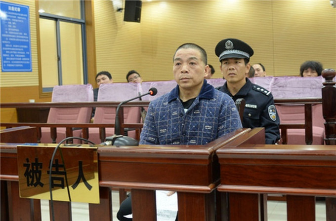 原中共廣西高校工委統戰部原部長李寧受審，被控受賄400多萬元人民幣。