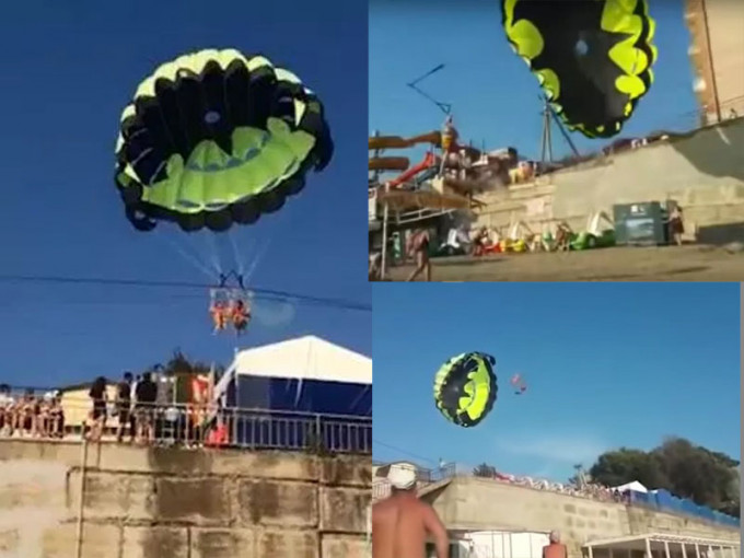 俄羅斯某渡假村一對情侶在海灘玩滑翔傘時，卻不慎碰到高壓電纜。(網圖)