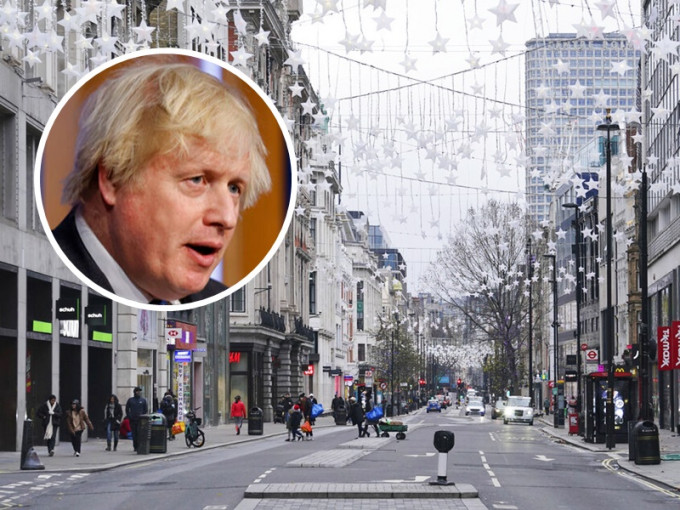 英国首相约翰逊（小图）周一将与政府首席科学顾问开会，决定英格兰会否再次封城。AP图片