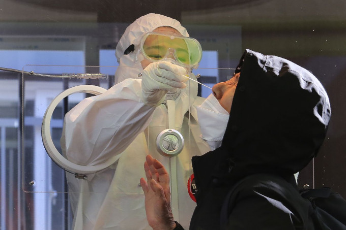 南韓目前累計已有12名變種病毒確診者。AP資料圖片