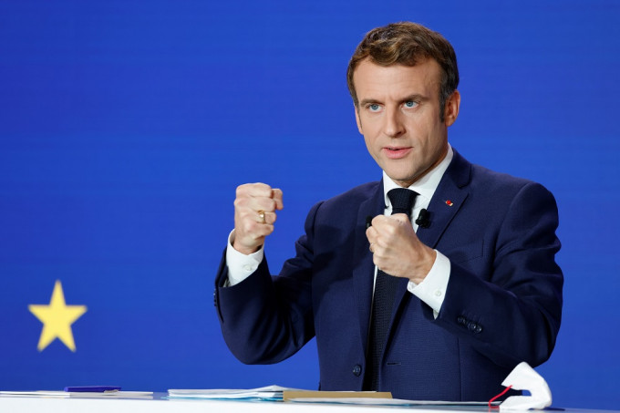 法國總統馬克龍認為不應將運動政治化。AP圖片