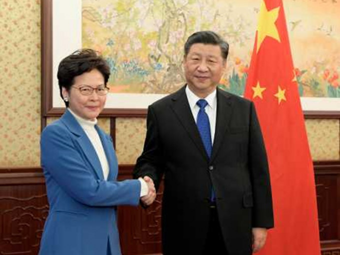 林鄭向國家主席習近平述職。新華社圖片