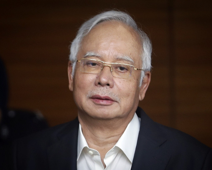 納吉布成為馬來西亞史上首名被控的前首相。AP