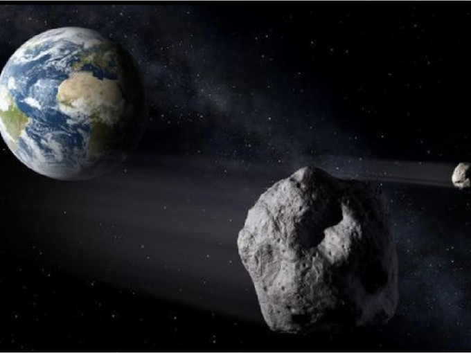 NASA估算，本周五（19日）将有3颗小行星掠过地球。（网上图片，示意图）