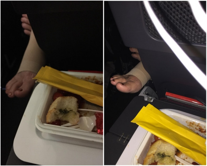 澳航有男乘客抱怨进食飞机餐时，前座一名女乘客从缝隙间伸出一只脚，靠在他的餐盘旁。网图
