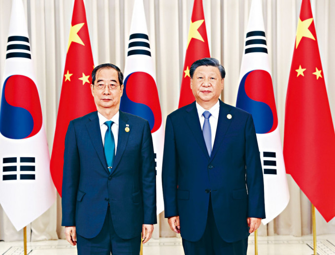 習近平在杭州會見韓國總理韓德洙（左）。