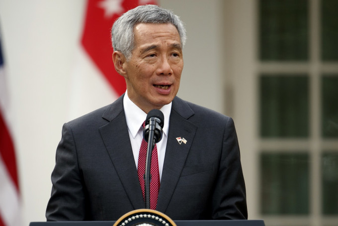 新加坡總理李顯龍宣布數月內改組內閣。AP圖片