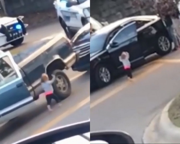 女童赤脚下车并举起双手走向警察。影片截图