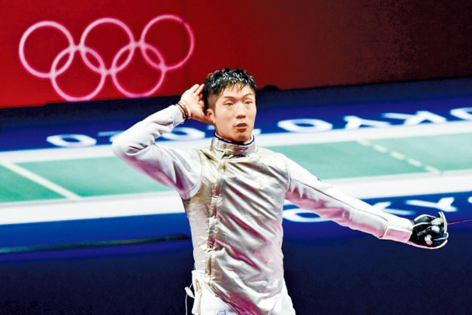 劍神張家朗為香港體壇摘取奧運金牌，全城振奮。