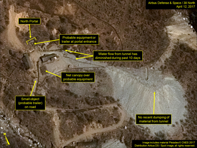 根据商用人造卫星于本月十二日拍摄到的丰溪里核子试验场照片，显示该核试场周围及北门区持续有活动。