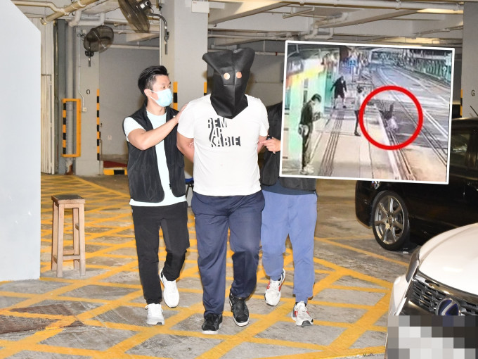 被告涉嫌在屯门轻铁站的月台上，将女子推跌落路轨被捕。资料图片/网图