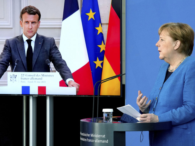 德國總理默克爾和法國總統馬克龍舉行視像會議，會後共同召開視像記者會。AP圖片