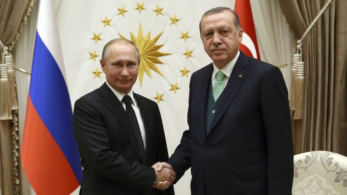 普京与土耳其总统通电话。AP资料图片