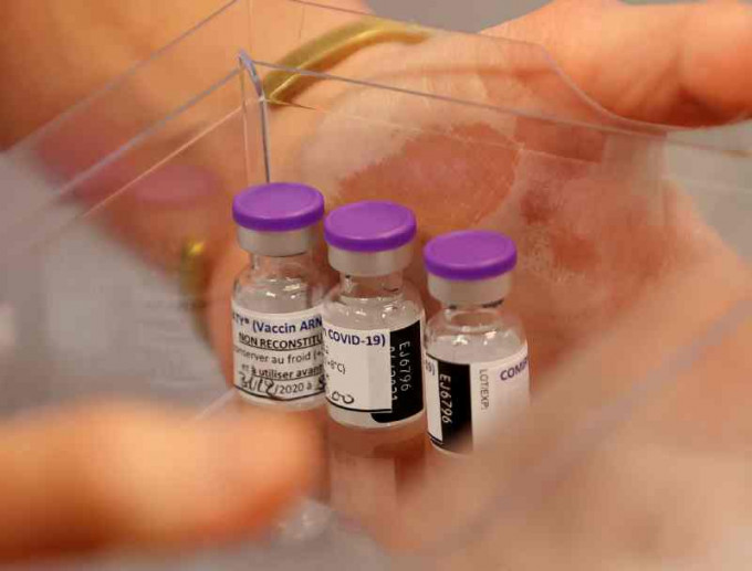 世卫将Pfizer和BioNTech研发的新冠疫苗列为可紧急使用。AP