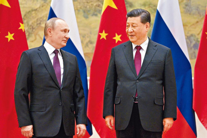 习近平和普京昨日在北京会面。