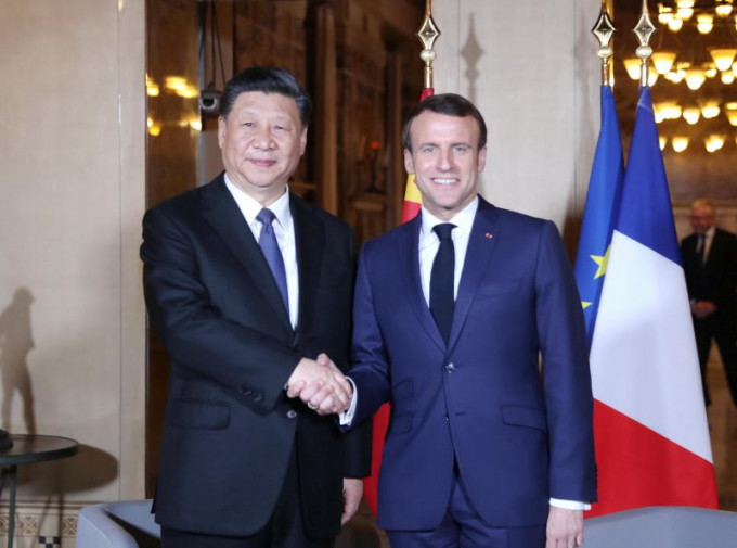 國家主席習近平在尼斯會見法國總統馬克龍。 （新華社）
