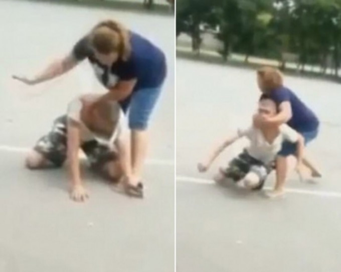 俄羅斯一名女子被一名男子偷取手機，因而將其按在地上並掌摑。(網上圖片)