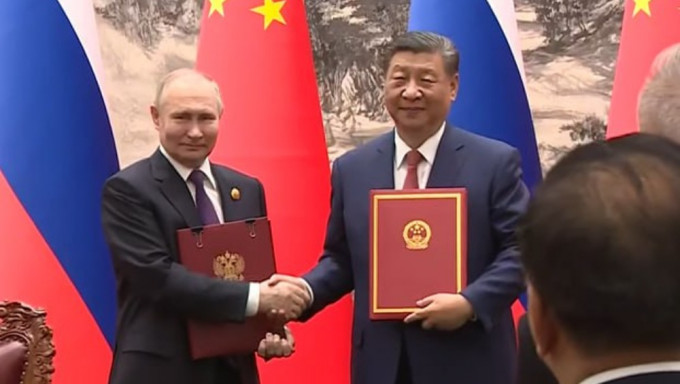 中俄签署《全面战略协作夥伴关系联合声明》