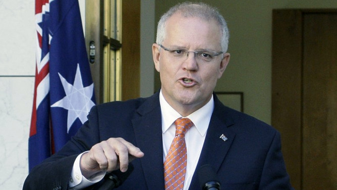疑曾秘密身兼多个部长，澳政府将对莫里森展开调查。AP资料图片
