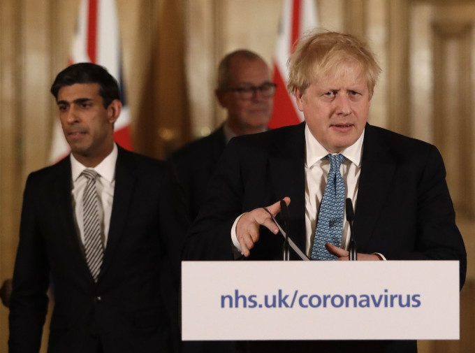 英國首相約翰遜在會上強調，必須確保支撐英國經濟。AP
