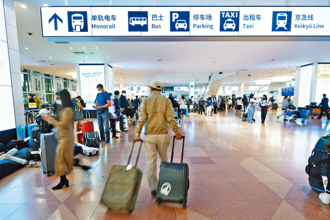 海外遊客回流日本，但日本人就不願外遊。圖為東京羽田機場。