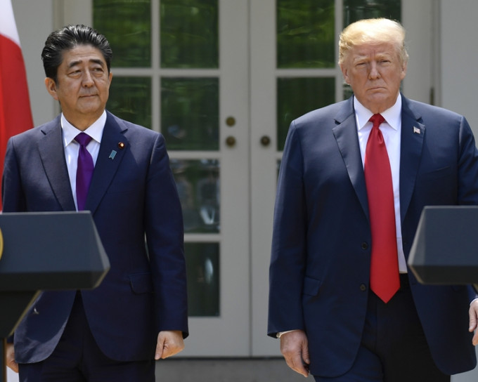 日本传媒报道安倍晋三是应美国的要求而提名特朗普。AP