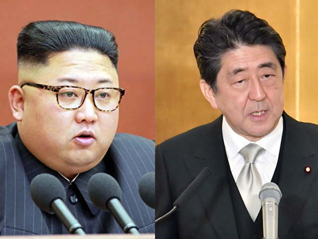 安倍(右)或八月与金正恩会谈。资料图片