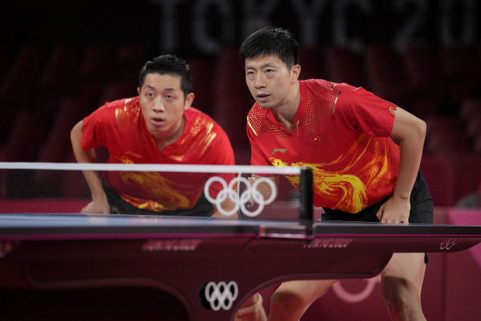 中国乒乓球组合在男子团体决赛将与德国争逐金牌。AP