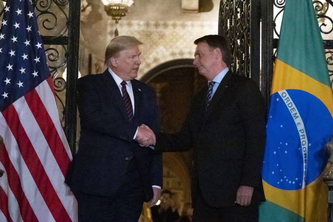 巴西总统博索纳罗上周访问美国，会晤美国总统特朗普。AP