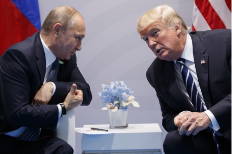 （左起）普京和特朗普下周可能舉行雙邊會談。AP