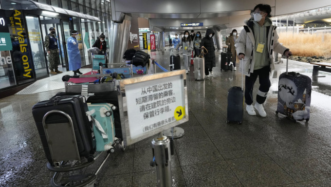 南韓明日(11日)起恢復發放中國公民入境短期簽證。 AP