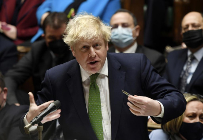 英国首相约翰逊引述科学家指，全英的Omicron疫情已达顶峰。AP图片