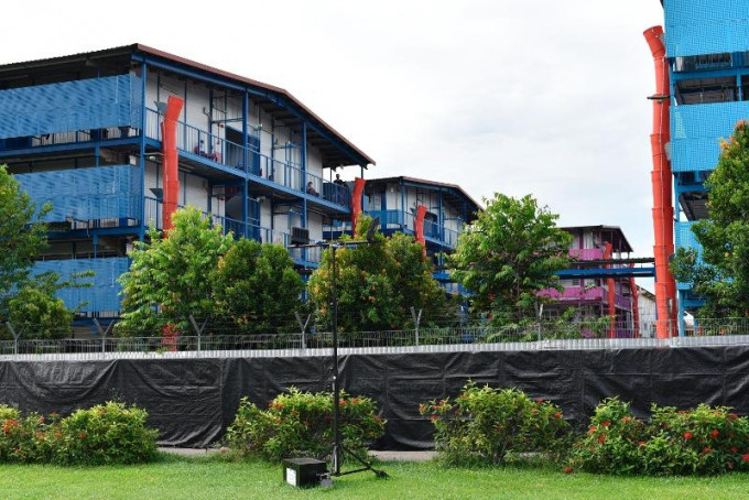 新加坡外劳宿舍的外劳成为主要感染群体。AP图