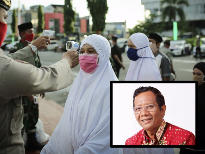 印尼安全统筹部长马富指「新冠病毒像妻子」难控制被轰是性别歧视。AP/网图