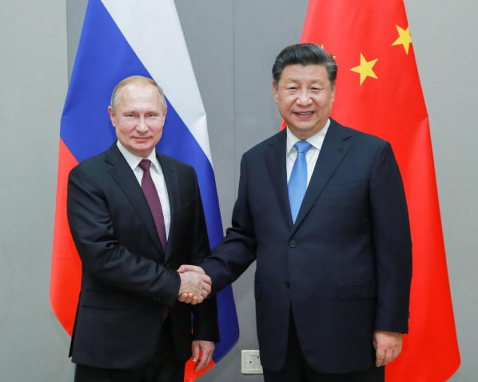 習近平會見俄羅斯總統普京，同意中俄加強戰略合作。(新華社)