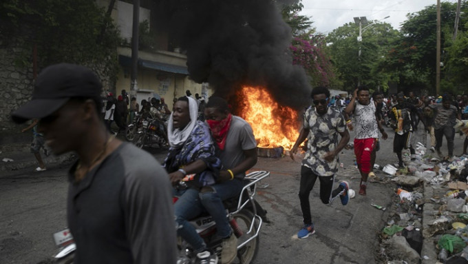海地社会动荡不稳，政府宣布押后至10月开学。AP图片