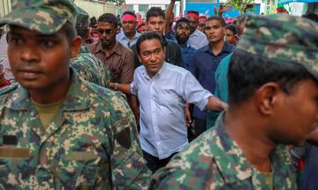 馬爾代夫總統雅門（中）繼續違抗最高法院要求釋放政治犯的命令。AP