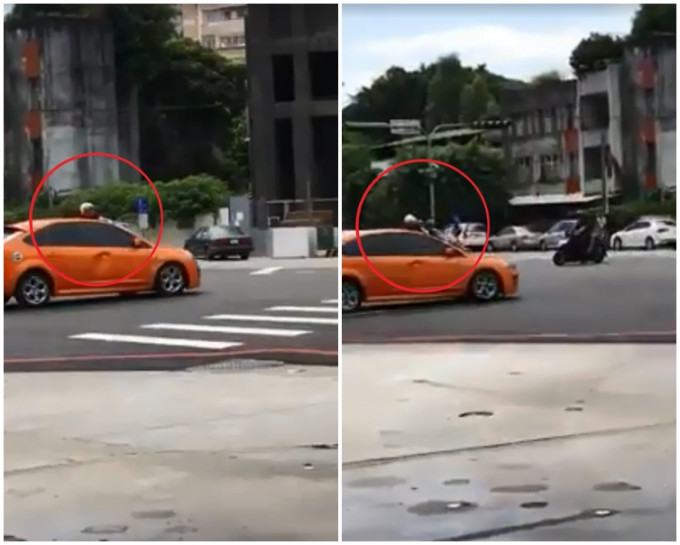 男子趴在一辆行进中的橙色轿车上。片段截图