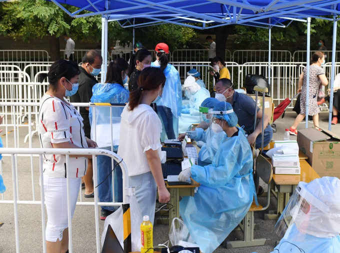 北京加强防疫工作。新华社图片