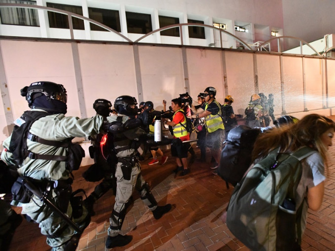 中律协批评示威冲突中暴力升级。资料图片