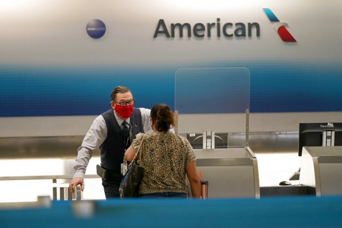 美國航空員工面臨飯碗不保危機。AP圖片