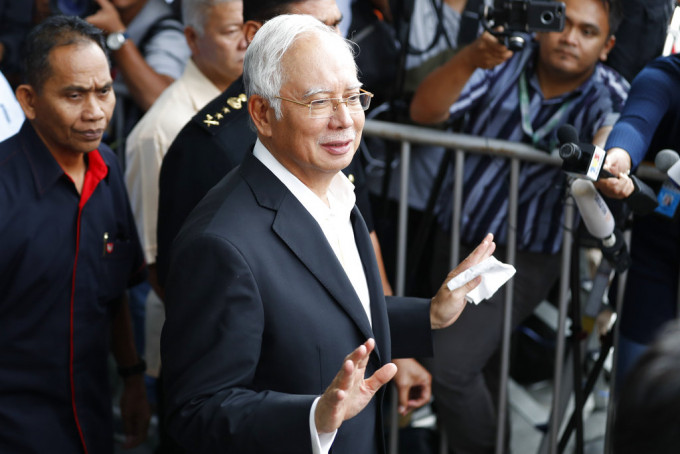 马来西亚前总理纳吉布涉嫌贪腐被捕。AP图片