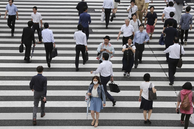 日本社会对共谋定罪存在争议。AP图片